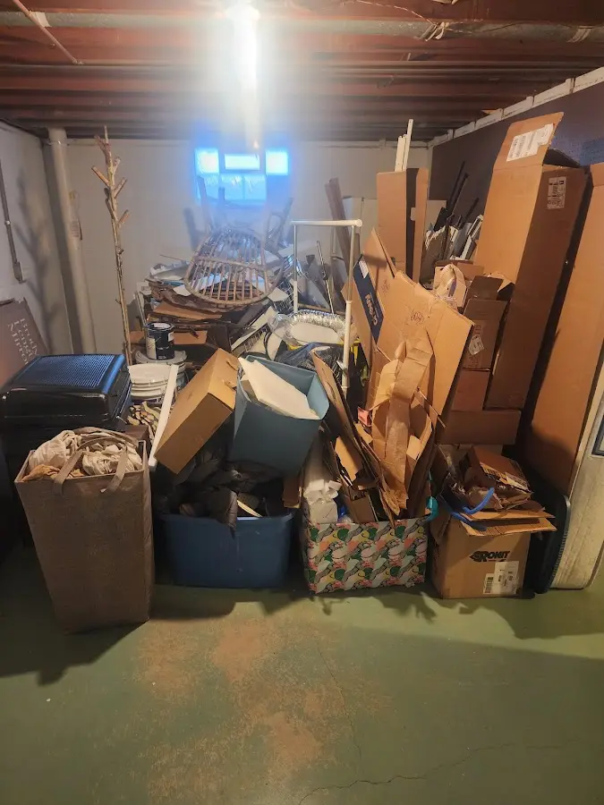 Roll-off dumpster container at job site for Roll Off Dumpster Rental in Lawrence